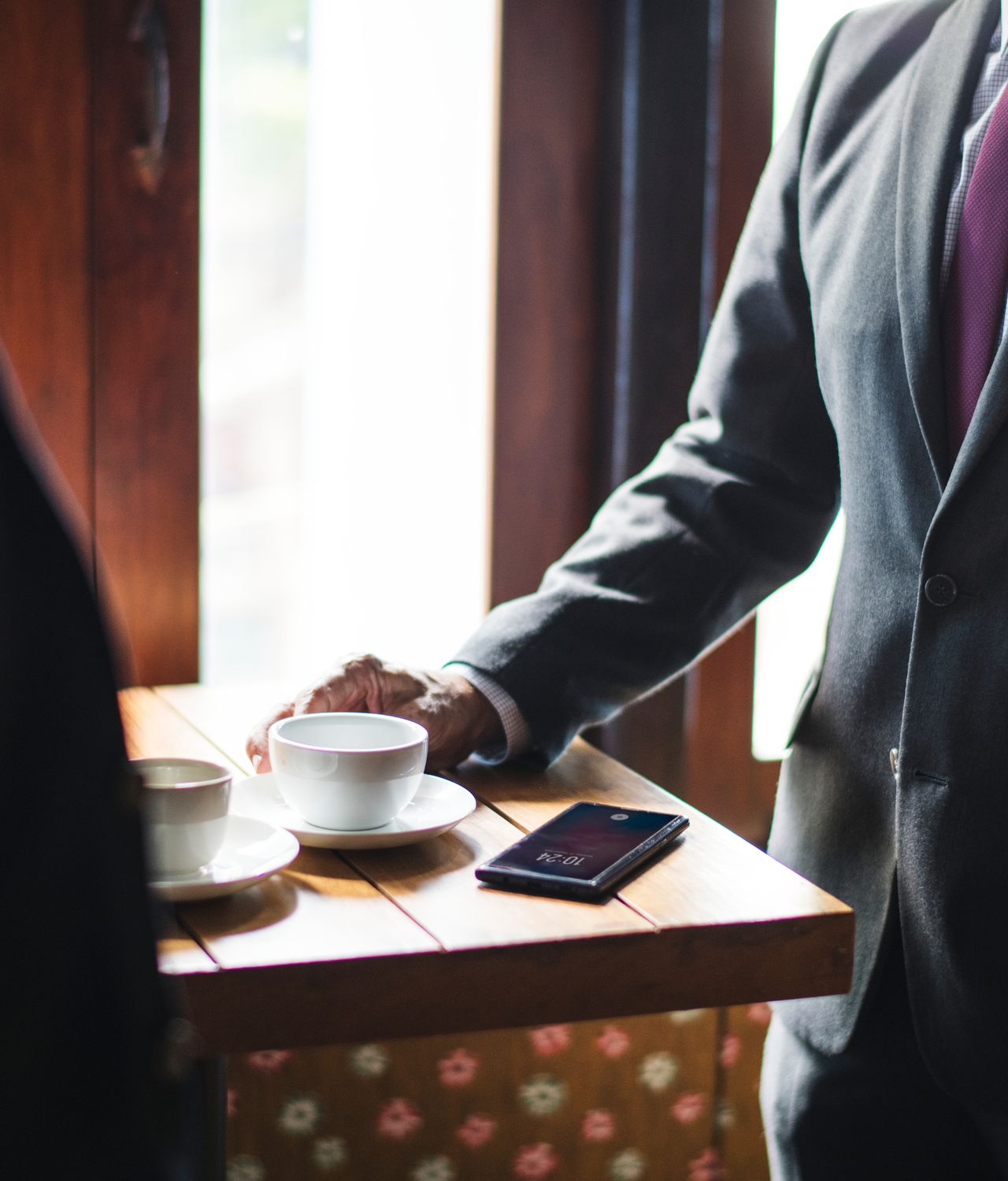 Two businessmen meeting for coffee